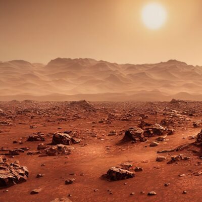 Rocky Martian landscape with scattered boulders under a bright sun