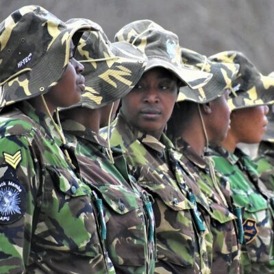 Members of the Black Mamba Anti-Poaching Unit in camouflage uniforms and hats
