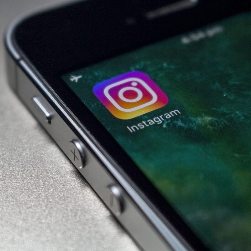 Close-up of a smartphone screen showing the Instagram app icon