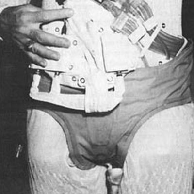 Close-up of early NASA urine collection device worn over astronaut suit