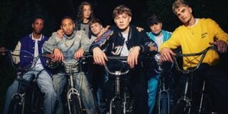 December 10 members posing with bicycles