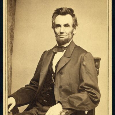 Abraham Lincoln in a formal 19th-century suit