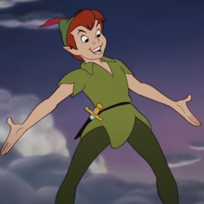 Disney's Peter Pan stands with arms spread in a green outfit